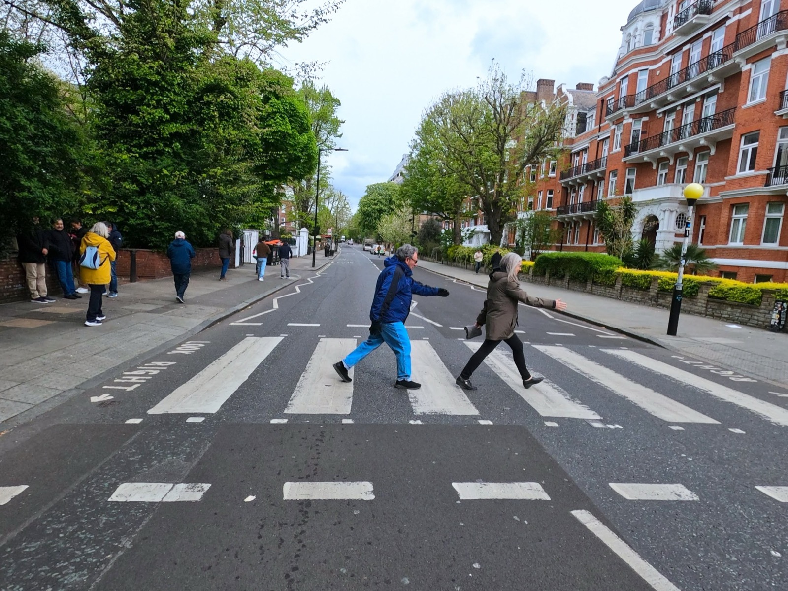 Family on Abbey Road crossing, London